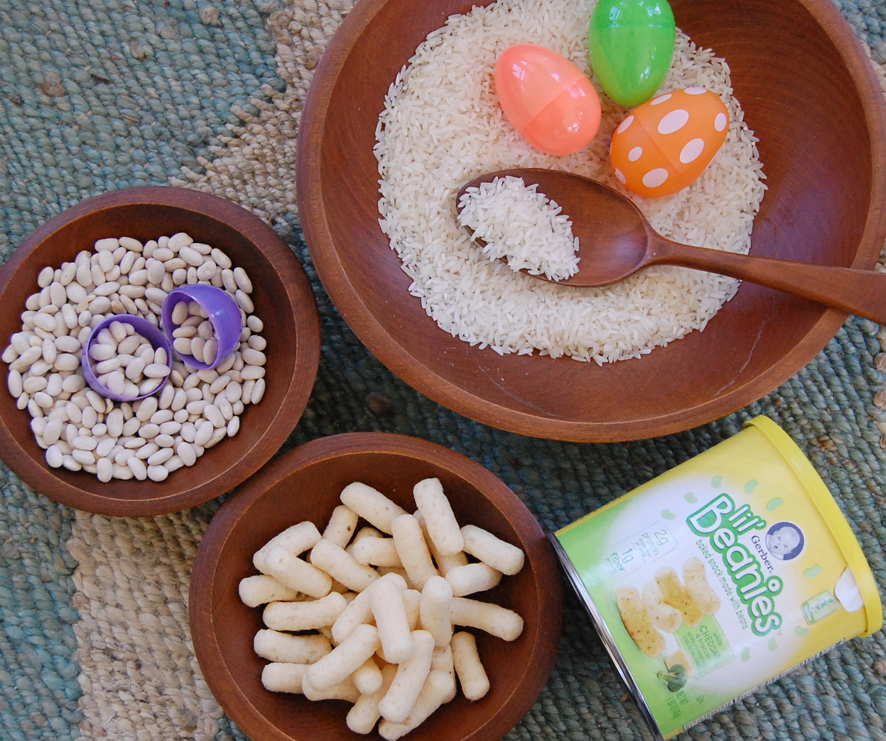 A fun toddler sensory experience using items from your pantry and leftover Easter eggs! #gerberlilbeanies #sensoryplay #toddlerplay #toddler snacks juliannegray.com