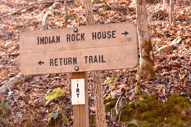 Trail signage along the Indian Rockhouse trail